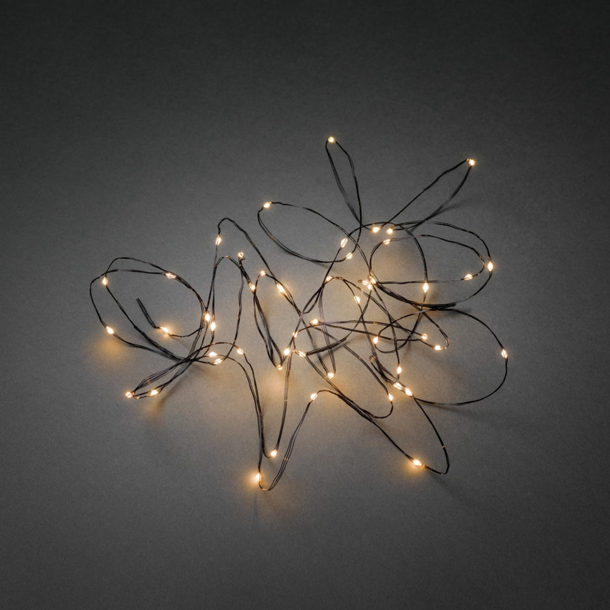Micro LED med Transformator Ljusslinga Inomhus 50 Lampor (4.9m), Amber/Svart Kabel